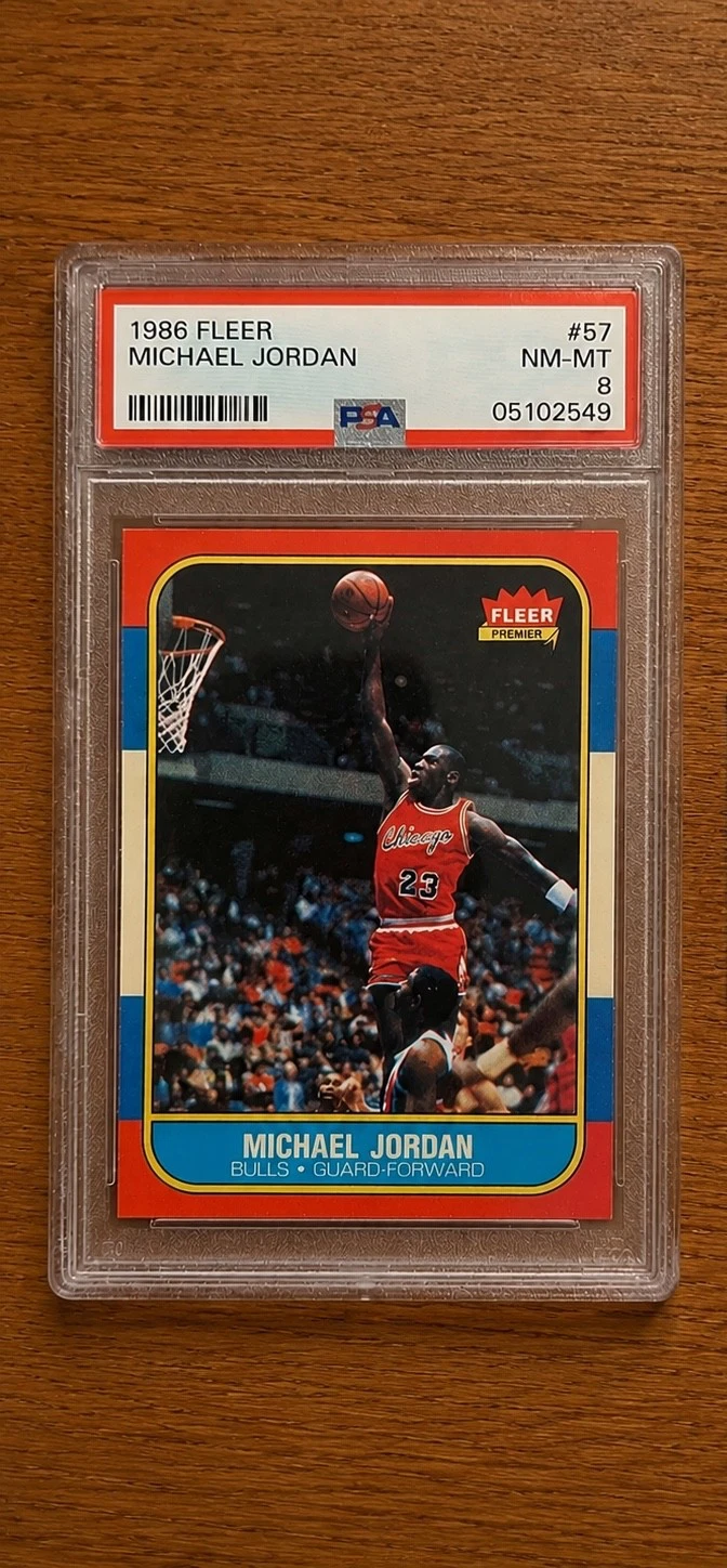 1986-87 Fleer - Michael Jordan #57 (RC) PSA 8 — $17,600, 35 bids, ending today on eBay