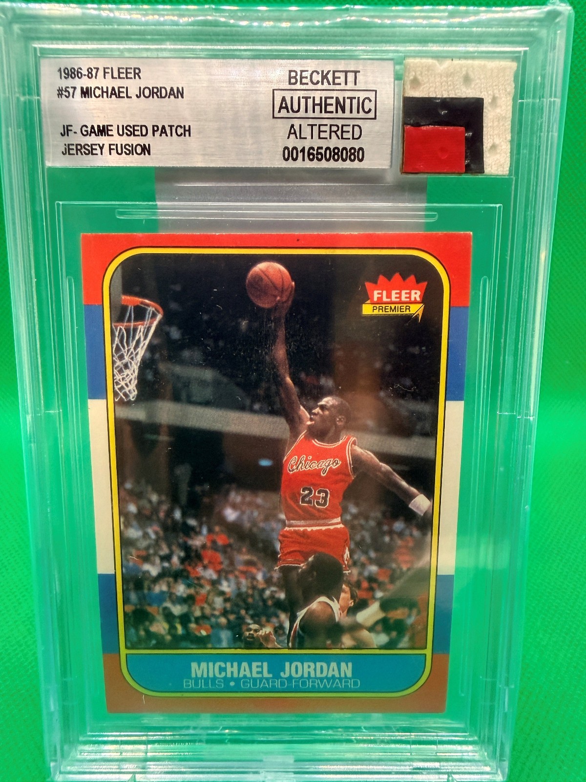 1986-87 Fleer Michael Jordan #57 Rookie Card Jersey Fusion Authentic Altered RC — sold for $7,300 on eBay