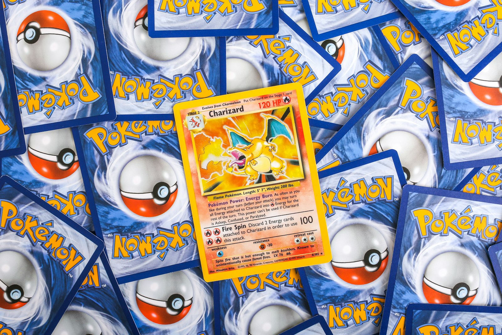 A pile of Pokémon trading cards