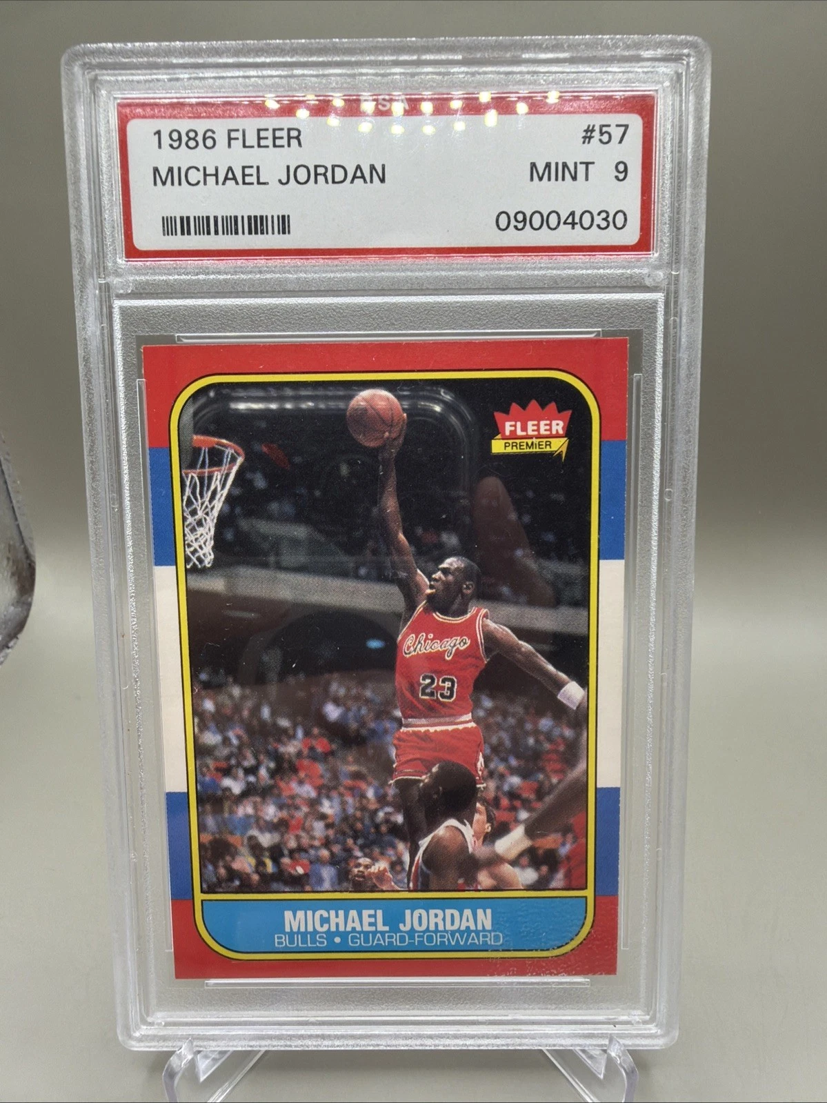 A 1986 Fleer #57 Michael Jordan rookie card graded PSA 9, cert 09004030, listed at $43,500 on eBay